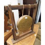 20th Century circular gong on hardwood stand with beater, a small rectangular stool, small two
