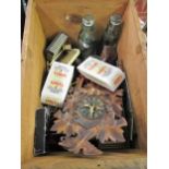 Wooden box containing a collection of miscellaneous items including a miniature cuckoo clock,