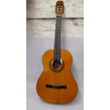 Student classical guitar by BM Ronda (Spain), together with a soft case, music stand and foot rest