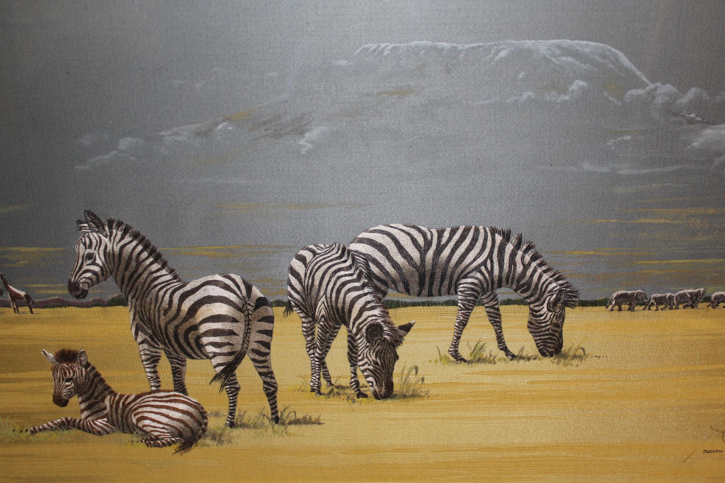 Judith Rodker, silkwork picture, zebra in a landscape, 38cms x 60cms, framed, together with