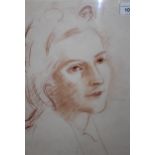 Monochrome red crayon head and shoulder portrait of a lady inscribed verso 'Imre Goth', 37cm x 26cm