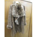 Meteo by Yves Salomon, ladies brown leather coat, size 36, together with an ivory fur scarf,