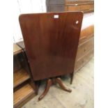 19th Century rectangular mahogany tilt-top pedestal table on turned column supports, with cabriole