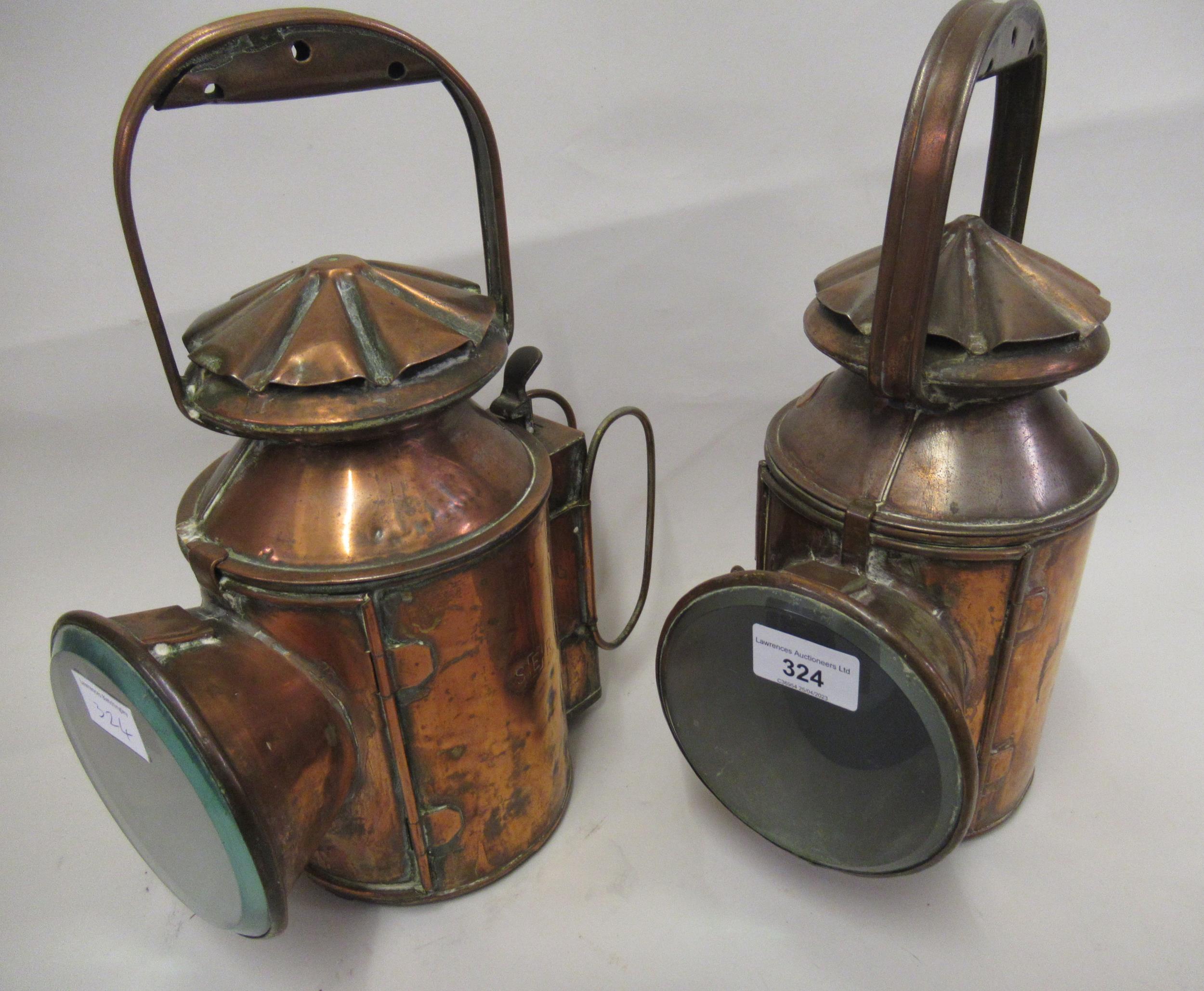 Pair of South Railway Eastleigh copper lamps with integral blue and red coloured glass indicators