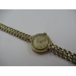 Ladies 9ct yellow gold Jaeger LeCoultre wristwatch with strap Integral 9ct gold bracelet 18g gross