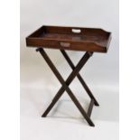 19th Century rectangular mahogany butler's tray on a folding stand, 65cms wide