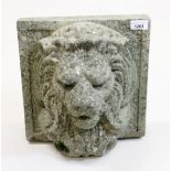 Weathered reconstituted stone fountain head in the form of a lion mask. 30cm x 32cm, together with a