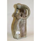 20th Century stoneware group of a mother and child, unsigned, 34cms high