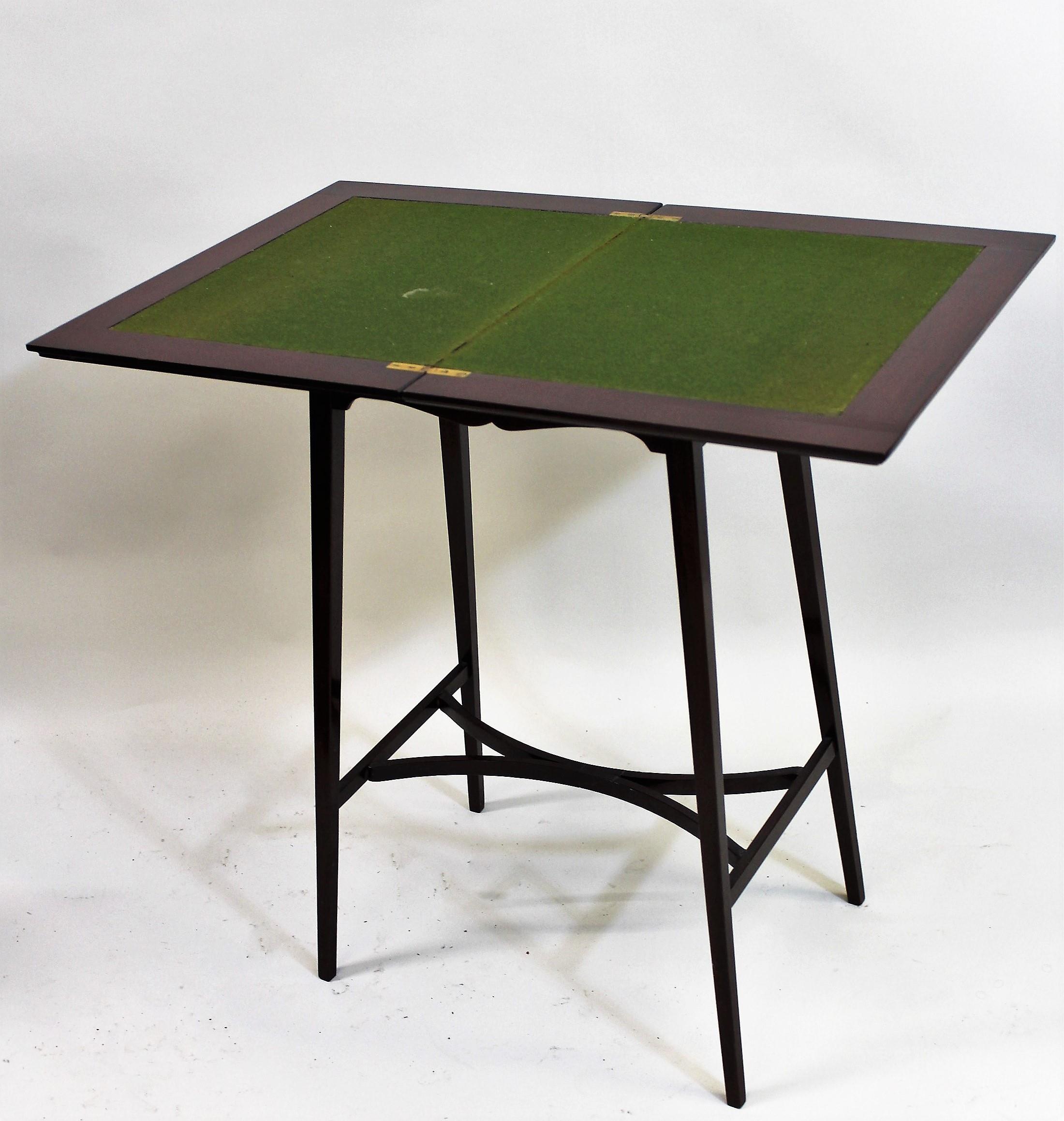 Edwardian mahogany crossbanded and inlaid fold-over card table, with baize lined interior, raised on - Image 3 of 3