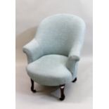Victorian pale green upholstered tub-shaped chair, raised on walnut carved cabriole front supports