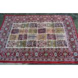 Machine woven Persian design rug with tile pattern, 190cms x 135cms