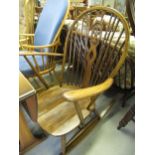 Mid 20th Century dark stained hoop and stickback rocking chair of Ercol type