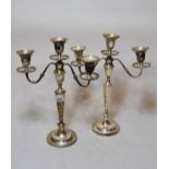 Pair of 20th Century London silver three branch candelabra, 32cms high