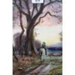 Early 20th Century watercolour, figure on horseback on a wooded track, indistinctly signed, dated '