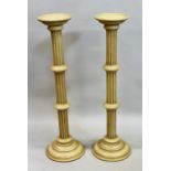 Pair of cream painted fluted column plant stands