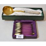 Cased set of twelve French white metal coffee spoons together with a French gilded and white metal