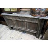 Late 18th Century oak three panel coffer, with carved decoration on stile end supports (base