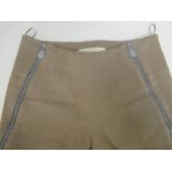 Balenciaga, pair of ladies trousers, size 36, together with two N. Peal, London, knitted dresses,