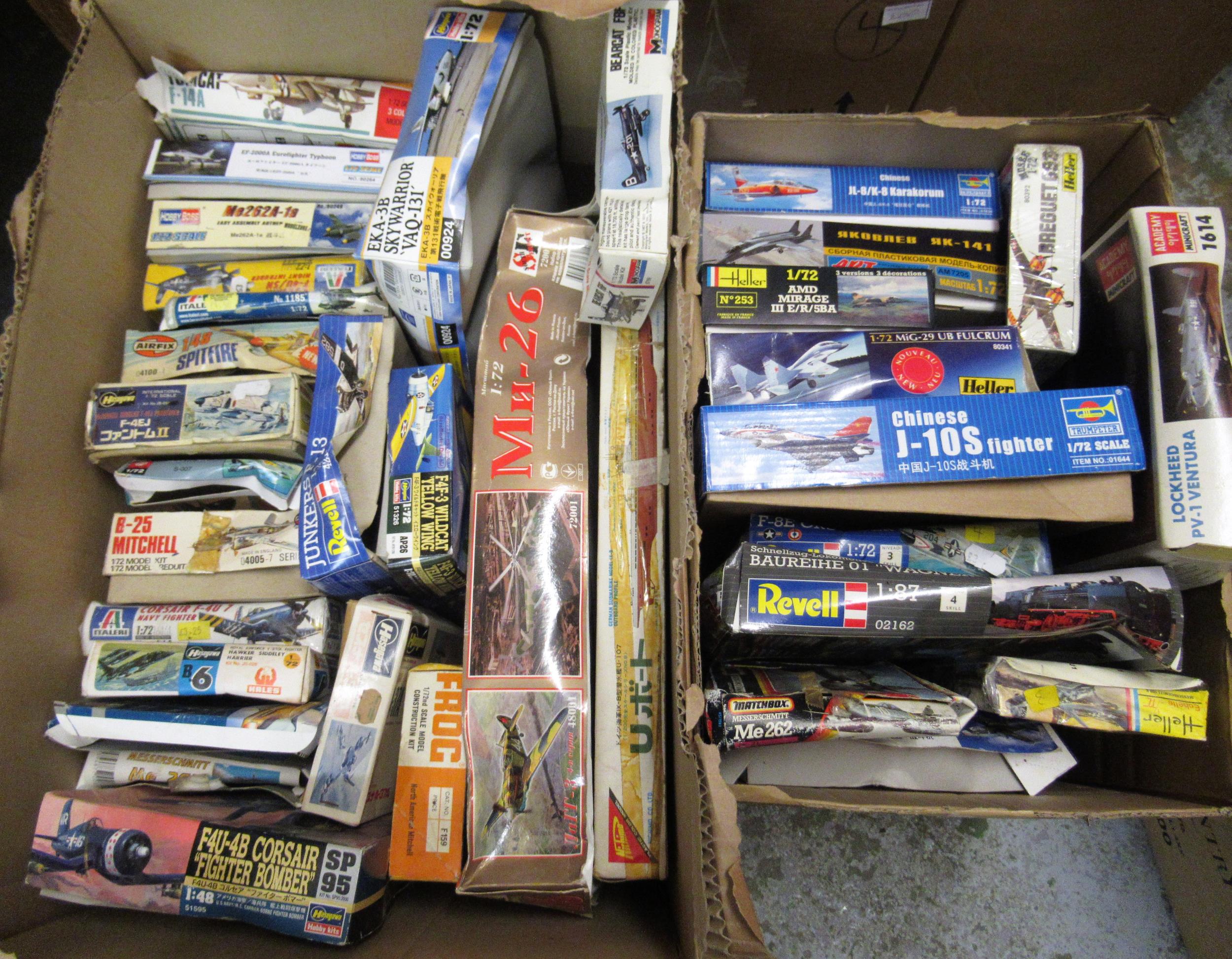 Two boxes containing a large quantity of unbuilt model aircraft kits including Airfix, Revell etc.