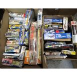 Two boxes containing a large quantity of unbuilt model aircraft kits including Airfix, Revell etc.