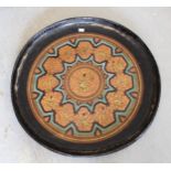 Large Far Eastern circular painted wall plaque, constructed from palm leaves