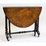 Victorian figured walnut oval drop-leaf Sutherland table on slender turned end supports