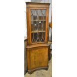 Reproduction mahogany inverted bow front standing corner cabinet