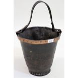 Antique leather and copper studded bucket with leather strap handle, 30cms high x 28cms diameter
