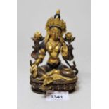 Small 20th Century Indian dark gilt and painted bronze figure of seated Buddha, 13cms high