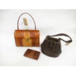 Two 1950's handbags, one with matching purse