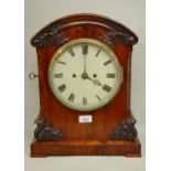 Victorian mahogany bracket clock, the painted dial with Roman numerals, the case with applied floral