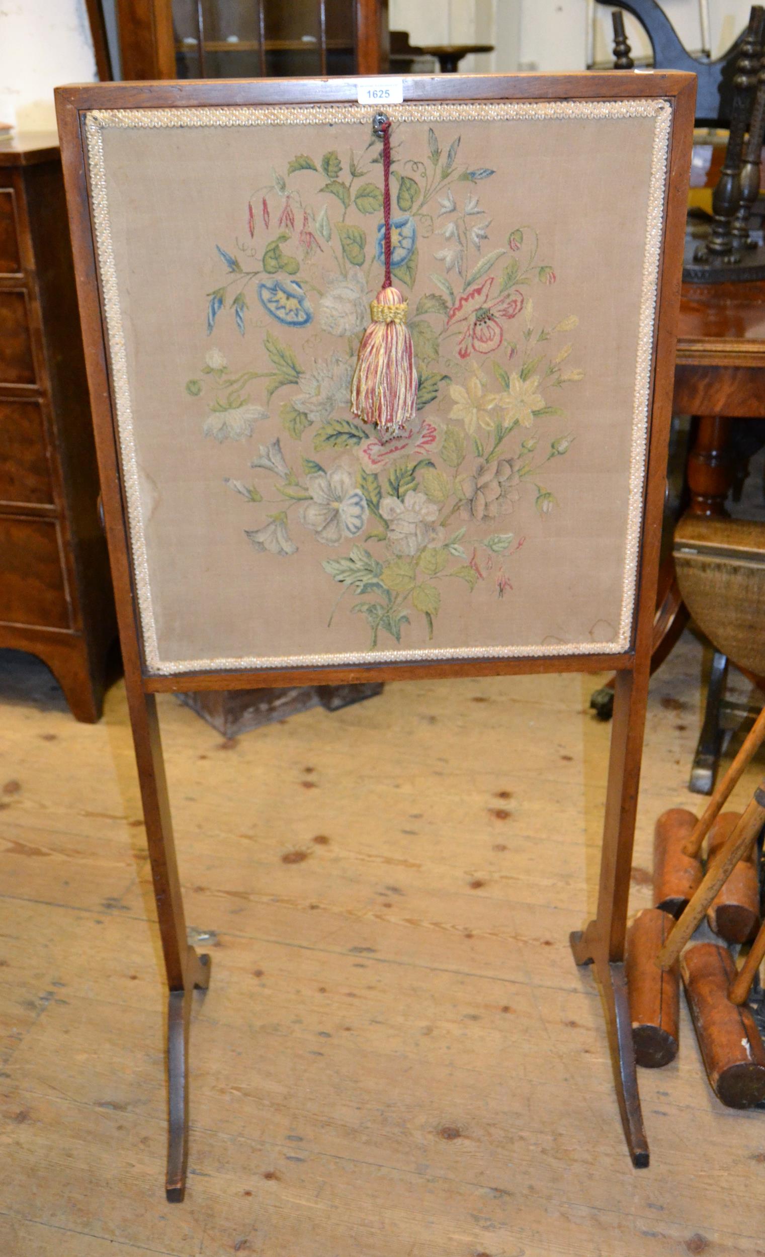 19th Century mahogany firescreen/ writing table, the woolwork inset fall front enclosing a fitted