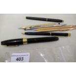 20th Century fountain pen with Sheaffer 14ct gold nib, three gold plated propelling pencils and