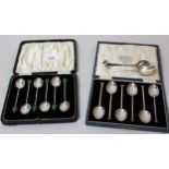 Two cased sets of silver coffee spoons, together with a set of six other coffee spoons