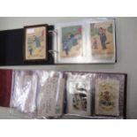 Two albums containing a collection of miscellaneous postcards