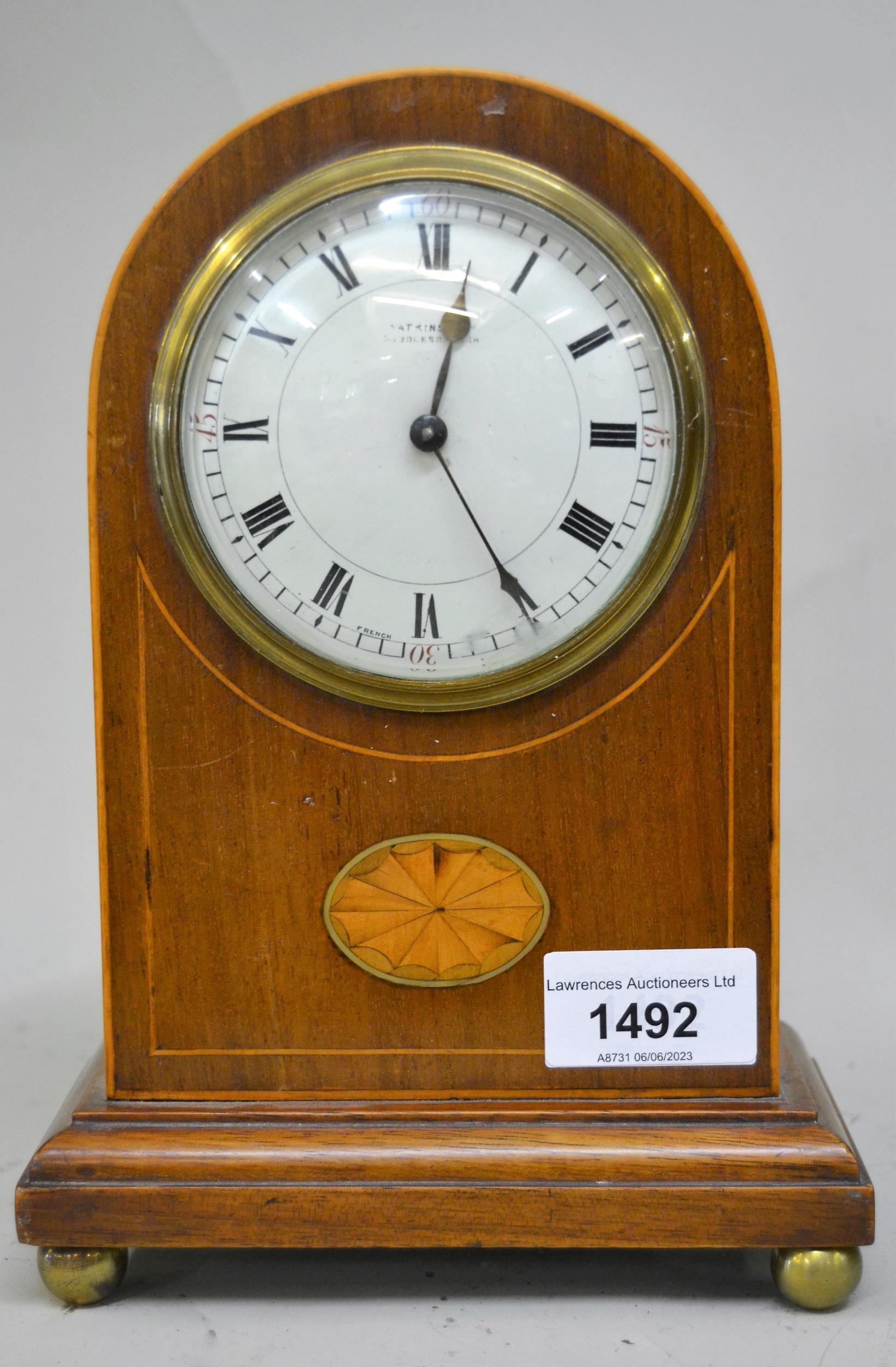 Edwardian mahogany and boxwood line inlaid mantel clock, the circular enamel dial with Roman