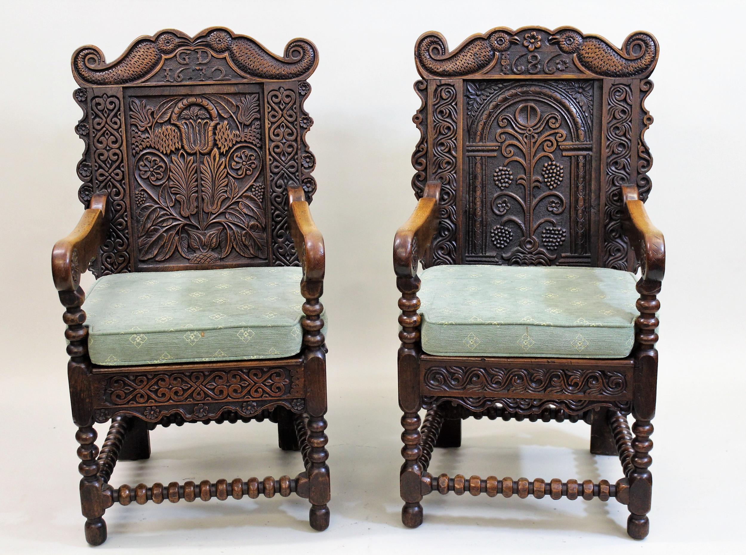 Near pair of carved oak Wainscott chairs in 17th Century style, the floral decorated backs above