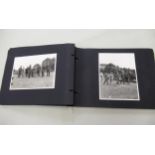 Album containing a collection of World War II photographs, some including Churchill Please see