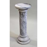 Modern marble torchere with circular top and base and fluted column, 80cms high