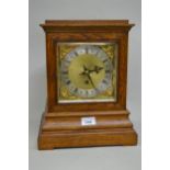 Late 19th / early 20th Century oak cased mantel timepiece, the gilt dial with a silvered chapter