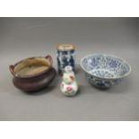 Chinese blue and white floral decorated bowl, 16cms diameter (restored), together with a small