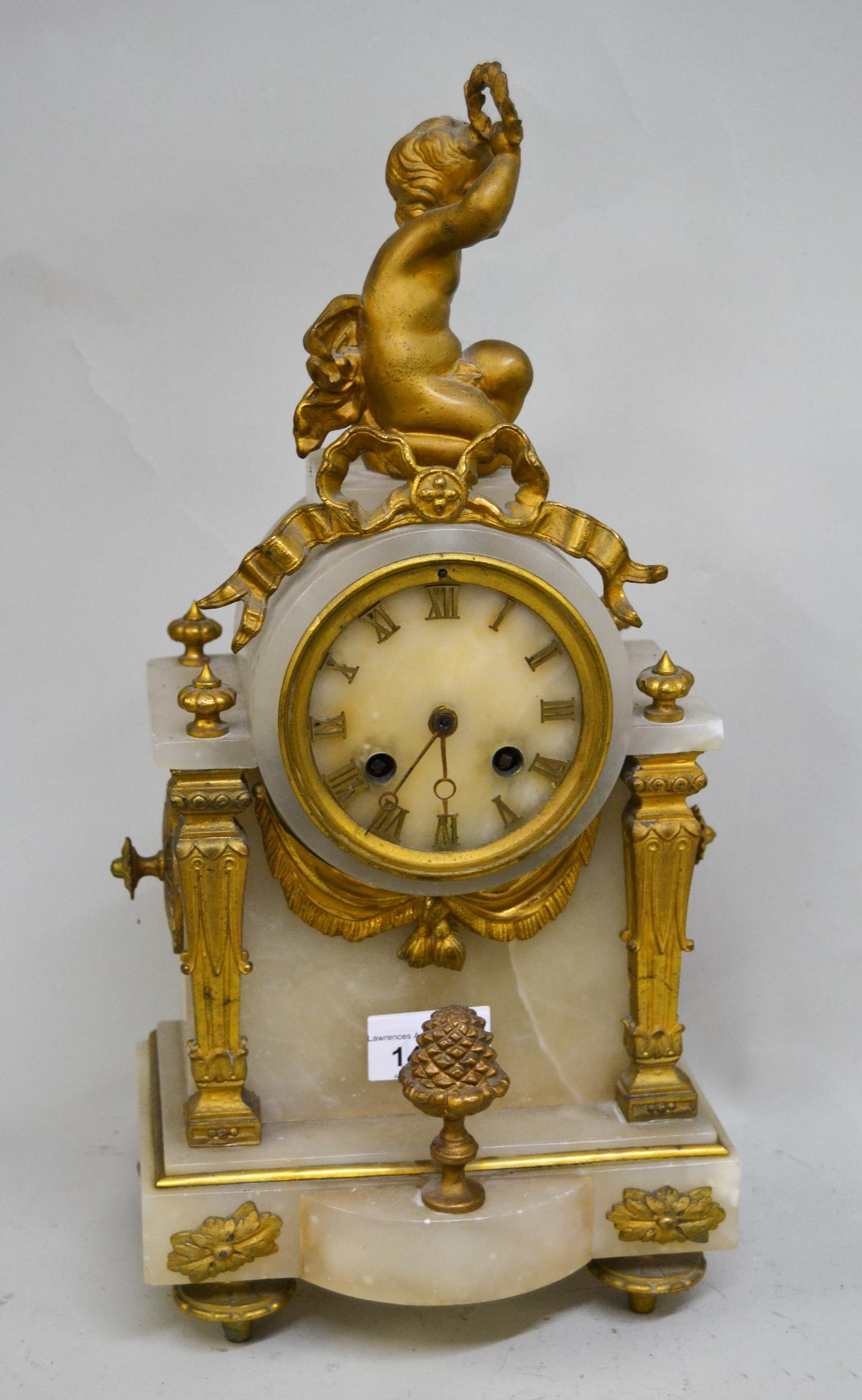 19th Century French alabaster and gilt metal mounted two train mantel clock