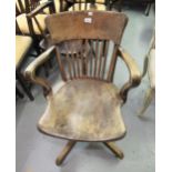 Early 20th Century slat back revolving office chair, by Finsbury Office Furnishing Company