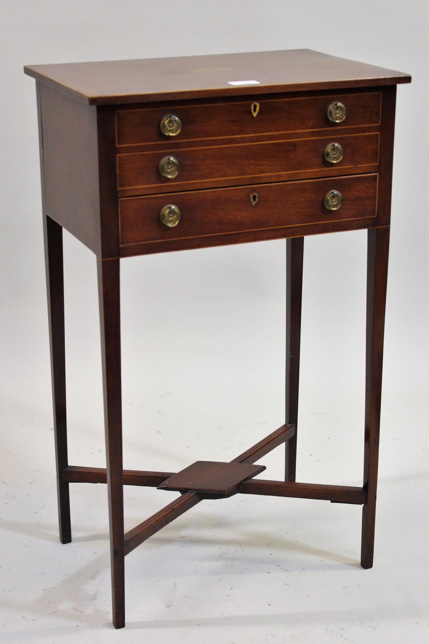 George III mahogany lunette and line inlaid work table, the hinged lid above two dummy drawers and a