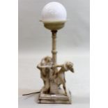 Early 20th Century carved alabaster table lamp, the opaque glass ball form shade above a tulip