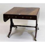 Regency mahogany and black line inlaid drop-leaf sofa table, the figured crossbanded top above two