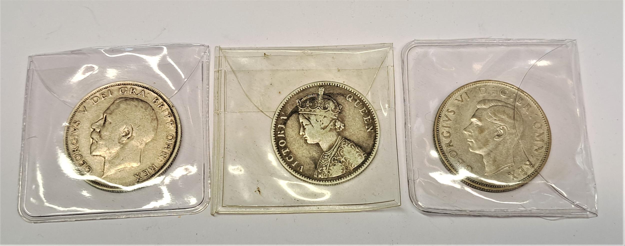 Three pre-decimal silver coins, together with a quantity of various Crowns and other commemorative - Image 2 of 2