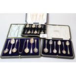 Cased set of six silver coffee spoons with tongs, cased set of six Art Deco silver coffee spoons and
