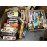 Two boxes containing a large quantity of various unbuilt model aircraft kits, including Airfix,