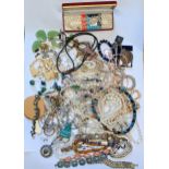 Box containing a quantity of various costume jewellery necklaces etc.